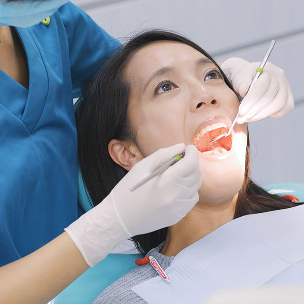 A patient undergoes an oral exam