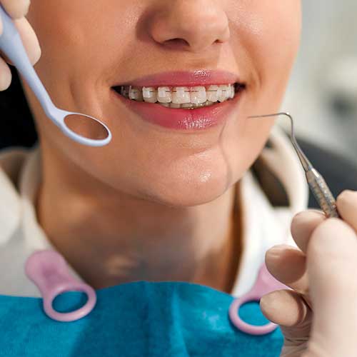 An oral surgery patient is examined